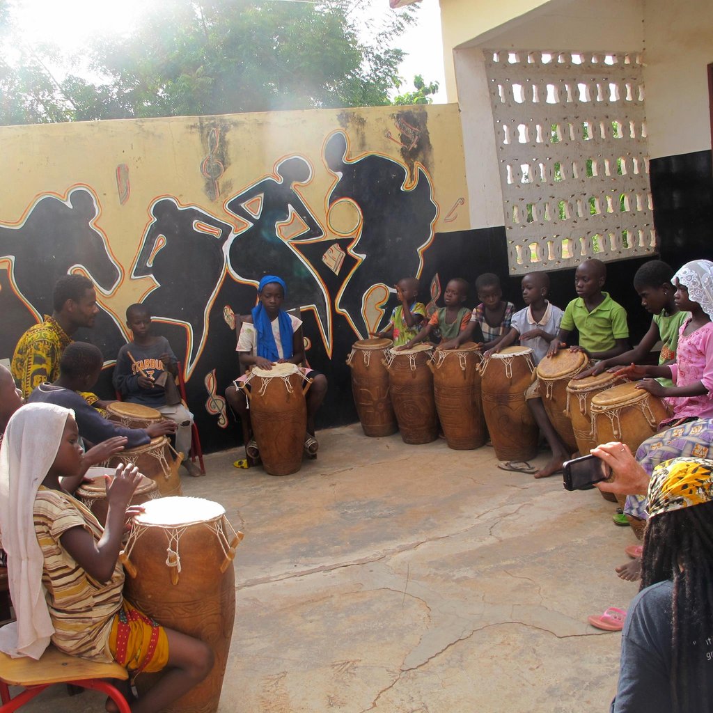 Bizung Founder, Alidu teaching a drum class