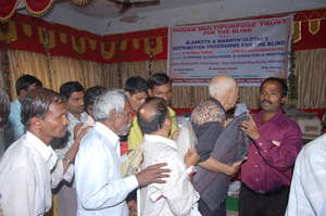 DISTRIBUTION OF BLANKETS .SWEATER AND WOOLEN CLOTH