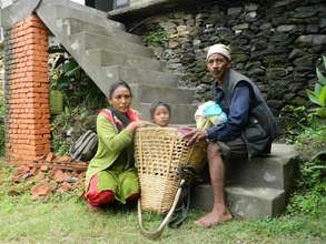 Burn patient Lukky with her parents