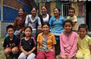 Rajbash Hospital staff with village children