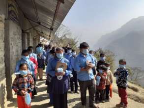 School children  with new masks and information.