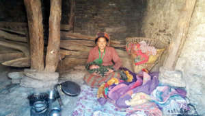 Chinkala, 22, and six day old baby in cowshed