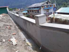 Rajbash Hospital's new retaining wall