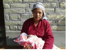 New mom Sunita with her baby girl