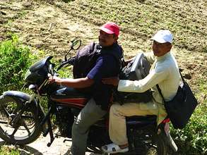 Min Prasad and the Headmaster on outreach mission