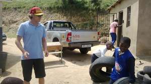 Tyler collects 1000 used tires for the school!