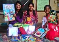 Kamla, Vimla and Deepa with books from Amazon