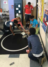 Students work with their Lego Robots