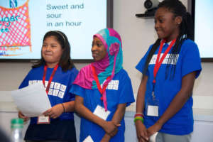 Students present business plans in Shark Tank.