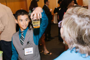 Student presents density experiment.