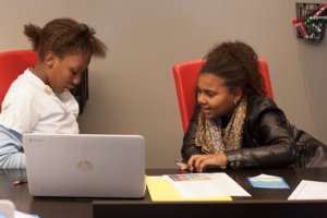 Students review their coding in an apprenticeship