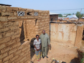 #1: Small house under construction for a widow