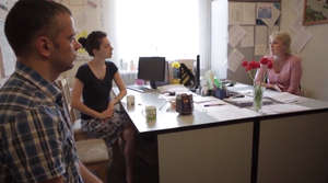 Team of operators  and social service worker