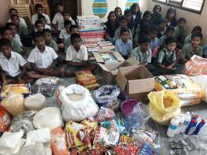 Groceries sponsorship to orphan children in India