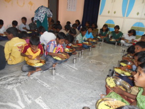 Sponsoring meals for the deprived children india