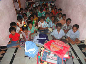 distribution of school bags to orphan children