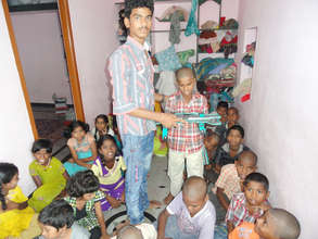 donation of school bags to orphan children in ap