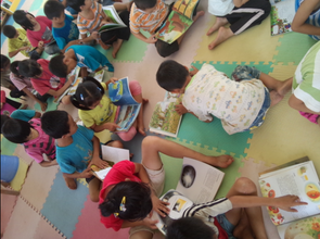 Students reading in the new school library