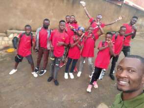 Joshua with his peers and mentors at camp