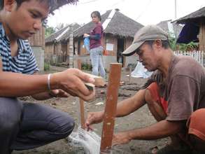 Efren and a Core Shelter volunteer