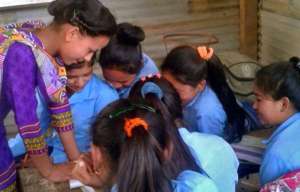 Samjhana supporting girls at the local school