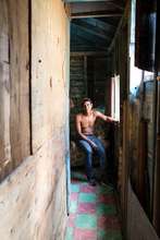 A man looks on after his meals were delivered