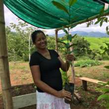 Maria is thrilled to receive her trees
