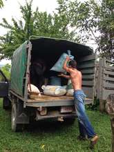 Daney's son helps load the truck