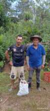 Alvaro and Cristian collecting guapinol seeds