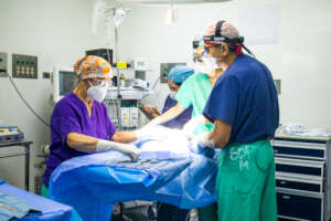 Dr. Khosla performing Surgery