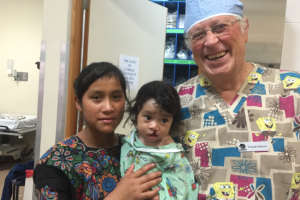 Another patient, Edvin, his mother and Dr. Nahum