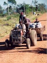 A dairy famer transporting milk to the Nyala cooli