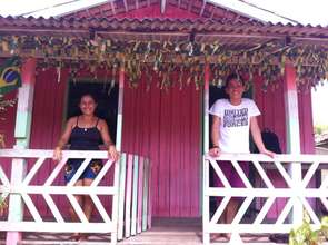 Andre and his mother at their house in Cajuuna