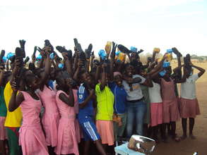 Executive Director with project beneficiaries
