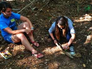 Instructor, Mary, coaching Emma on the bow drill