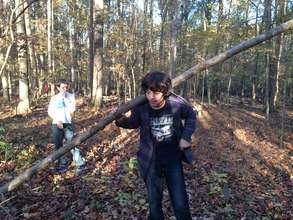 Christian with the tree he felled