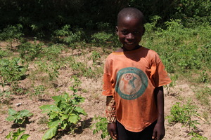 School boy in his new garden in Sisene