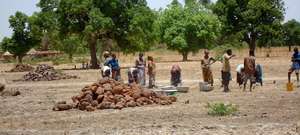 Villagers Building Rainwater Catchment Basin