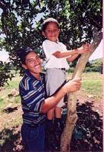 A Nicaraguan farmer and his child