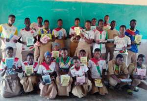Ouakuy students with books