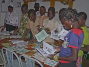 Children examine the donated books