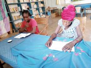 Girls read in Koumbia library