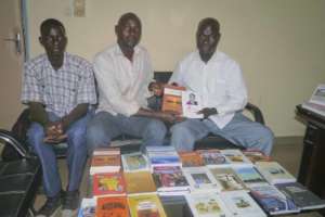 Books presented to library of Koumbia
