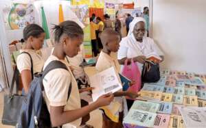 Students examine the FAVL books