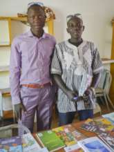 Rouko officials with donated books