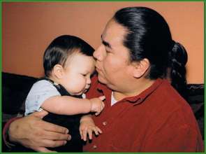 Aboriginal Dad and Baby ~ "Love grows brains"