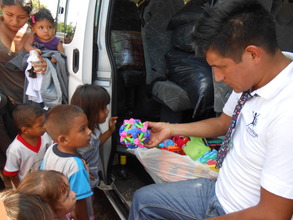 Distributing toys for the children