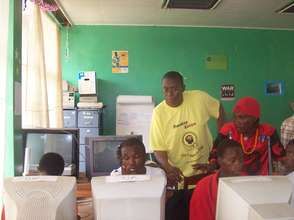 youths receiving computer proficiency training