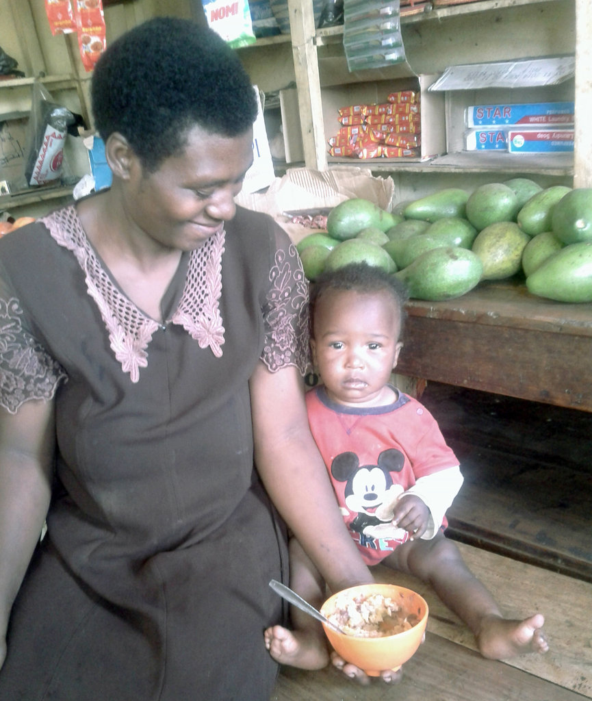 Sarah, a mother of six, feeds her child Ekitobeero