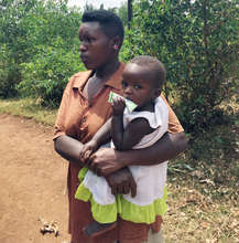 Little girl from Uganda with her mother